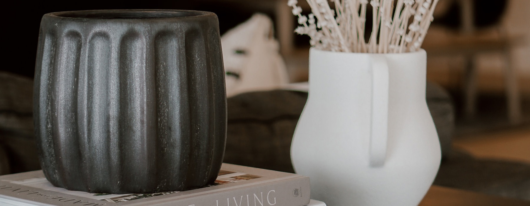 vases and books decorate coffee table